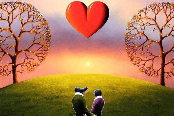 Kjærligheten endret livet mitt: Mann og kvinne ser på hjerte i himmelen