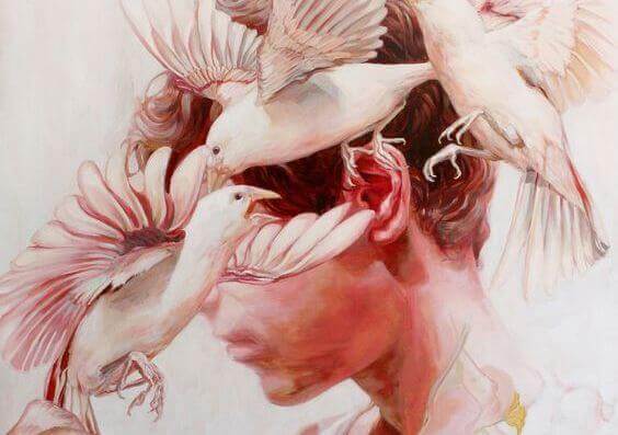 Fugler som omringer et hode