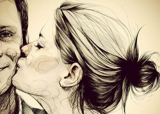 Kvinne kysser noen på kinnet