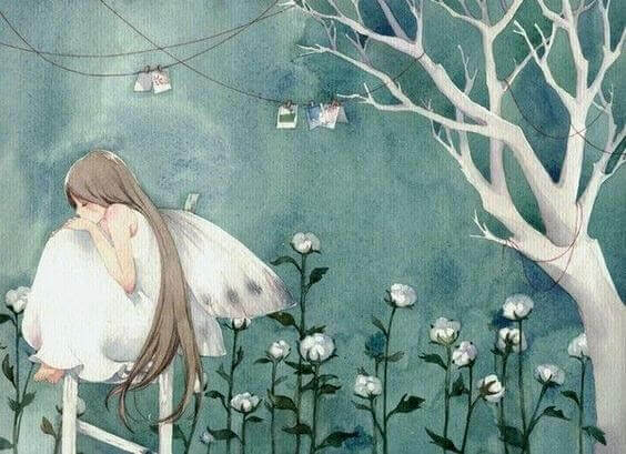 jente med vinger sitter i blomster
