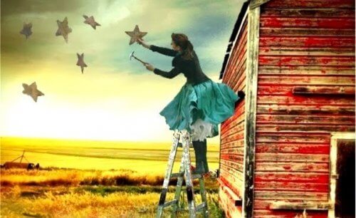 Kvinne maler stjerner