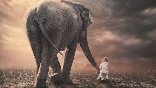 Elefant og liten jente