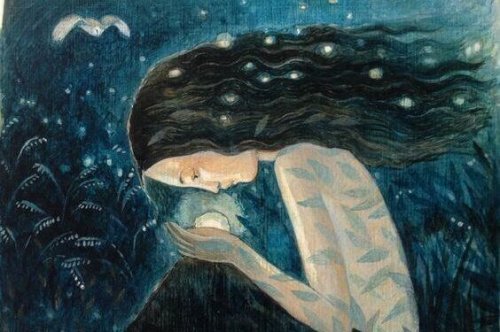 Kvinne ser på krystallkule