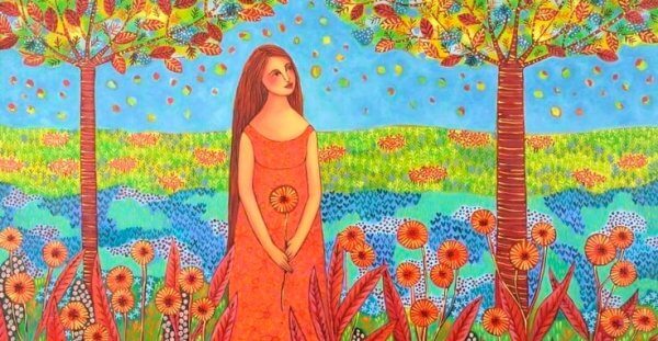 Kvinne i blomstereng