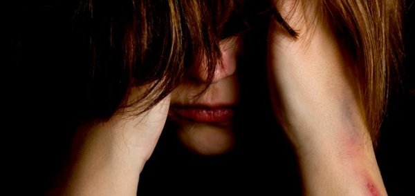 en kvinne som har blitt misbrukt