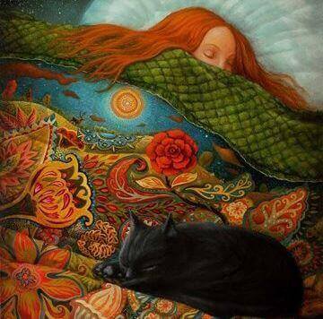 Kvinne og katt sover