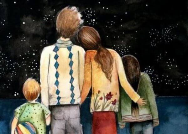 lykkelig familie ser på stjernene