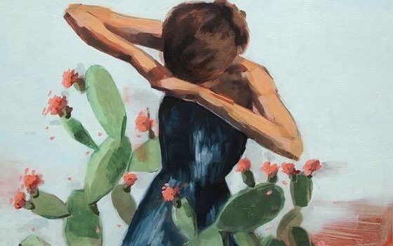 Kvinne fanget i kaktus