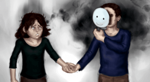 jente holder hånden til en med maske