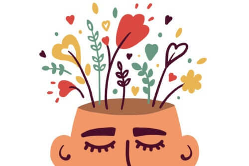 En mann med blomster som vokser på hodet.